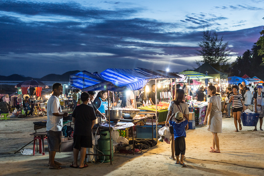 A bustling street scene or market in Pakse