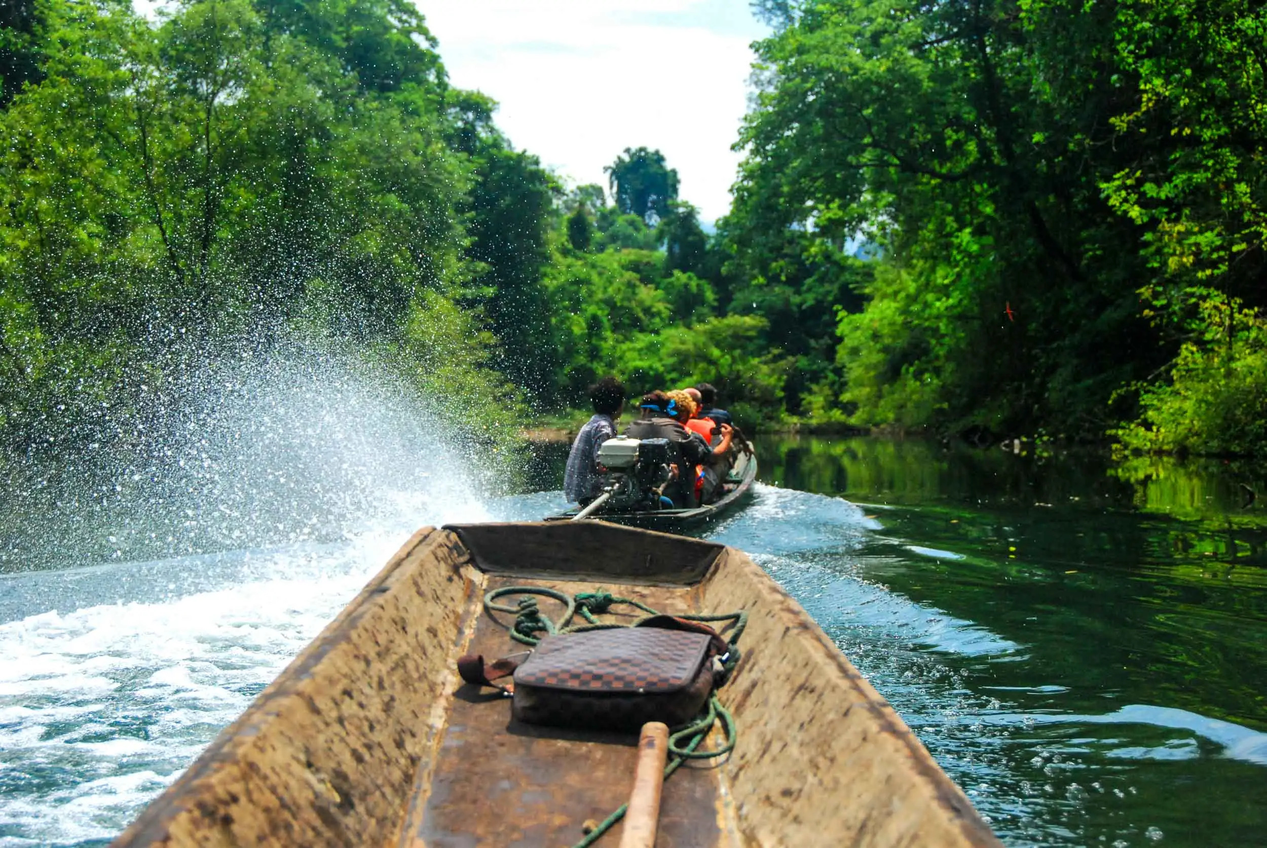 Boat traveling into the massive Konglor Cave